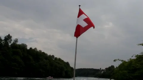 Swiss flag flying at the boat floating on  Rhine Stock Footage 42016355