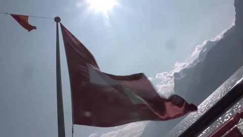 A Swiss flag on Lake Lucerne. Stock Footage 286045392