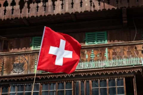 Swiss flag in the wind Stock Photos