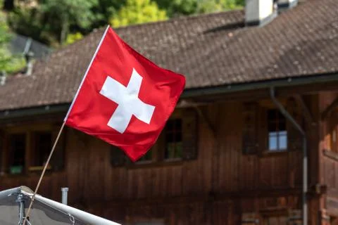 Swiss flag in the wind Stock Photos