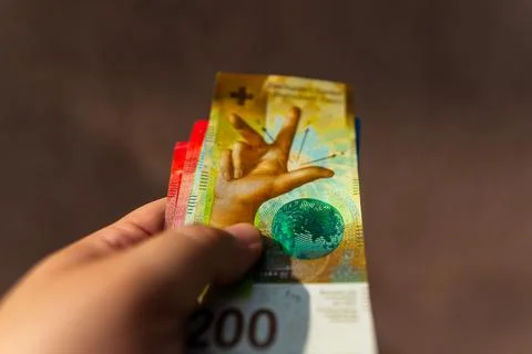 Swiss Franc CHF banknotes representing Swiss currency finance banking and m.. Stock Photos