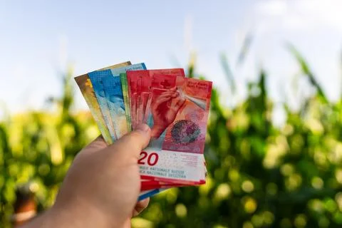 Swiss Franc CHF banknotes representing Swiss currency finance banking and m.. Stock Photos