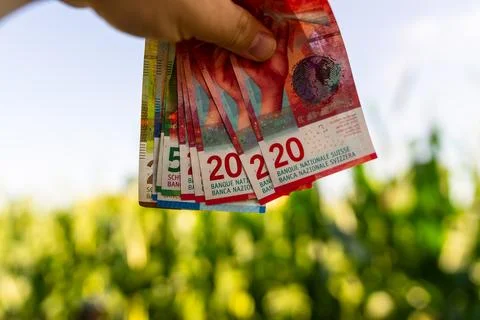 Swiss Franc CHF banknotes representing Swiss currency finance banking and m.. Stock Photos