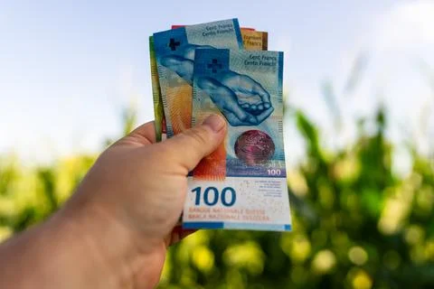 Swiss Franc CHF banknotes representing Swiss currency finance banking and m.. Stock Photos