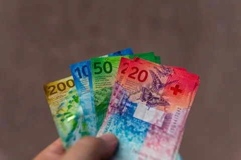 Swiss Franc CHF banknotes representing Swiss currency finance banking and m.. Stock Photos