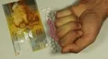 Swiss Franc CHF, Counting Drugs and Money, Health Care, Colorful Pills HD Footage