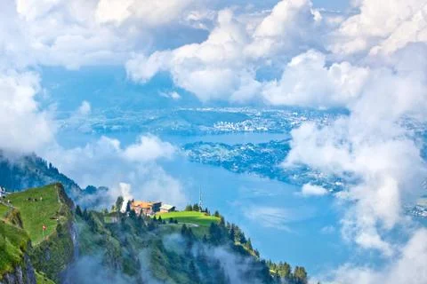 Swiss landscape through clouds Stock Photos
