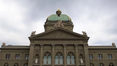 Swiss parliament building with dramatic background, medium establishing shot Stock Footage 283496230