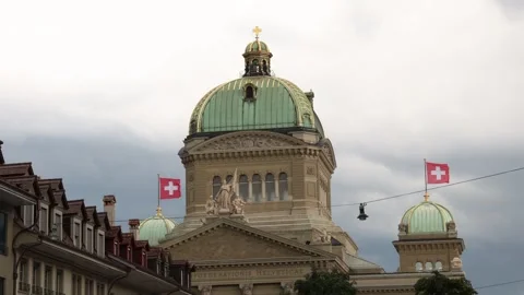 Swiss parliament building with dramatic dark storm background, establishing Stock Footage 283496103