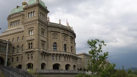 Swiss parliament with dramatic dark sky in the background, cinematic establisher Stock Footage 283494007