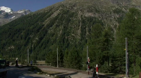 Swiss Train in Front Of Glacier Stock-Footage 502831