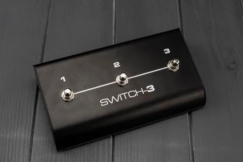Switch effects pedal with three guitar processes Stock Photos