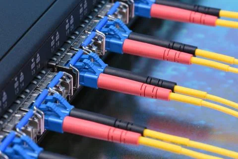 Switch with fiber optic cables Stock Photos