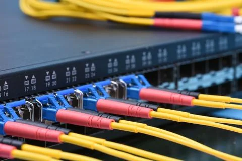 Switch with fiber optic cables Stock Photos