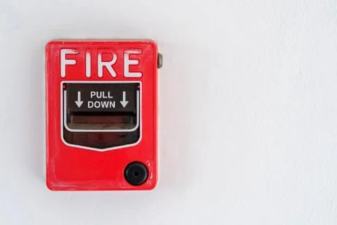 Switch to Fire alarm system on white wall background Stock Photos