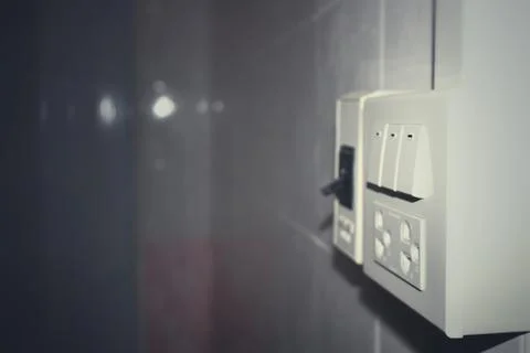 Switch on - off Light with plug outlet and breaker electrical appliance at ho Stock Photos