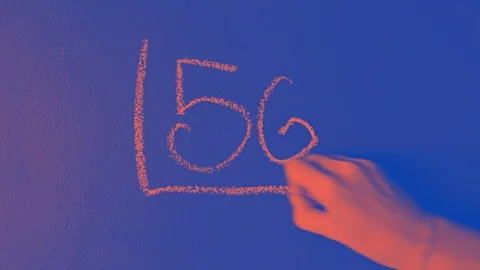 Switch over 3g between 4g and 5g symbol, hand erase and write n on blackboard Stock Footage 120093688
