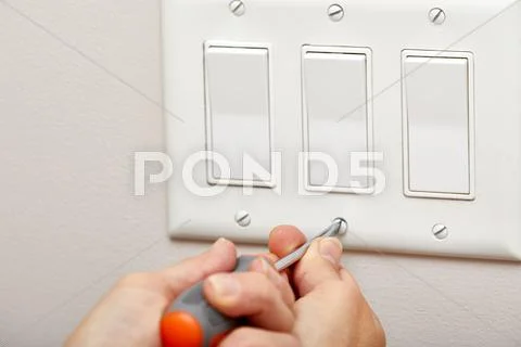 Switch repairing. Stock Photos