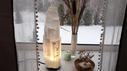 Switch on rough big selenite crystal tower pole lamp illuminated. 스톡 동영상 170002502