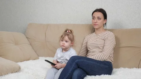 Switch the transmission on the channel with the remote control, control the TV Stock Footage 161819020