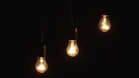Switch on, turn off light bulbs. Warm yellow light Stock Footage 263717642