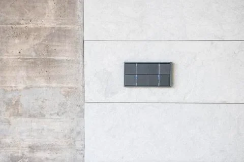 Switch, turn on or turn off the lights on concrete wall in room. Stock Photos