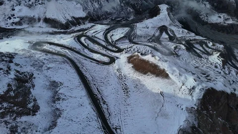 Switchback Road On Snow Covered Mountain Pass Aerial View Stock Footage 327459138