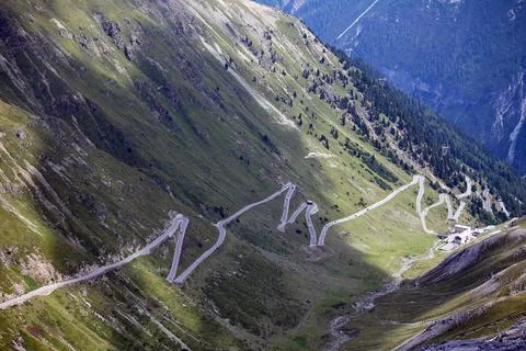 Switchbacks of the Italian highest mountain pass Stock Photos