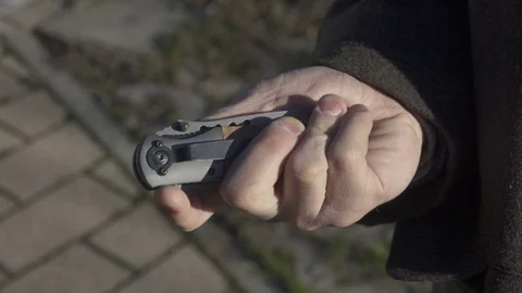 Switchblade Automatic Knife, Opening Blade, Slow Motion Stockbeeldmateriaal 71486915