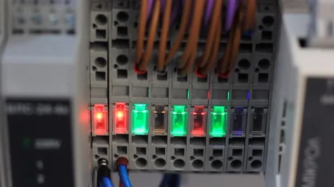 Switchboard control panel with connected wires and burning lights Stock Footage 121888440