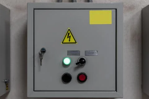 Switchboard with supplied electricity under lock Stock Photos