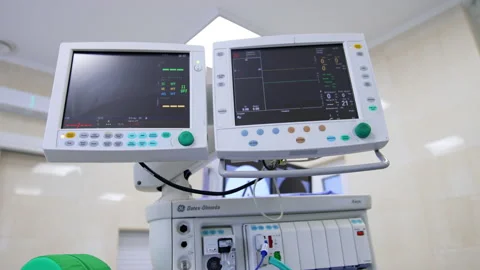 Switched on monitors of a modern anesthesia machine smart ventilator. Stock Footage 235478398