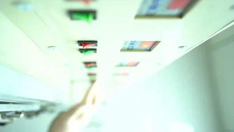 Switches and regulators. Hand presses buttons Stock Footage 247706975