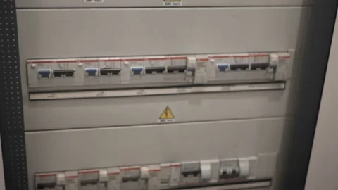 Switches on the electrical panel with numbers. inscriptions in Italian. 380v Stock Footage 132010304