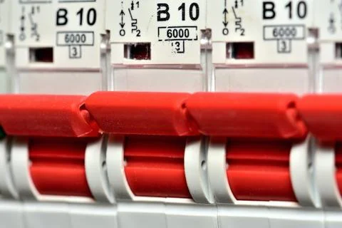 Switches of modern circuit breakers designed for light circuit to 10 amps max. Stock Photos