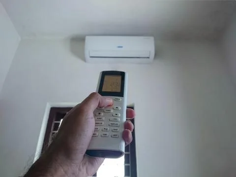 Switching on the AC Foto stock