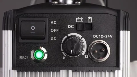 Switching On and Adjusting Studio Light Power. Stock Footage 256238022