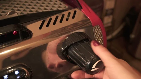 Switching the button of a coffee machine Stock Footage 100856839
