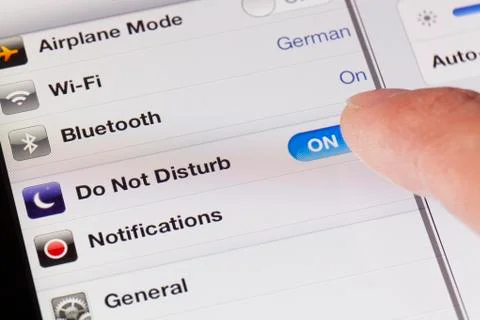 Switching to do not disturb mode on an iPad Stock Photos