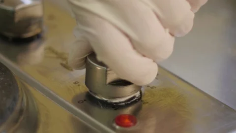 Switching on the Electric Cooker Stock Footage 98151133