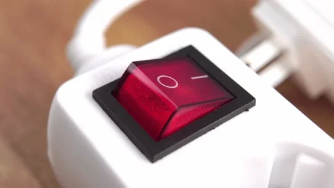 Switching off electricity by pressing the red push button switch of an home e Stock Footage 164726939