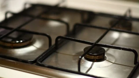Switching on gas and turning it off Stock Footage 34034976