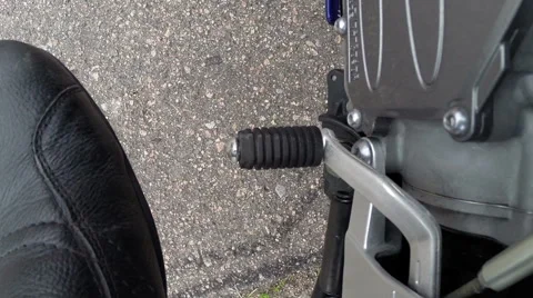 Switching gears on a motorcycle Stock Footage 64976736