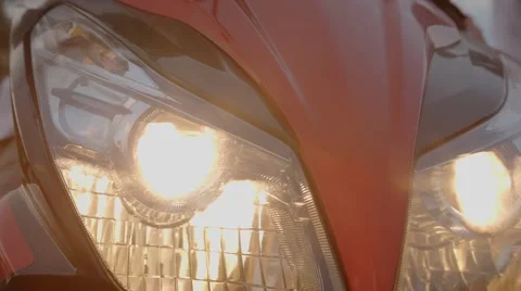 Switching on the headlight of the motorcycle Stock Footage 49408240