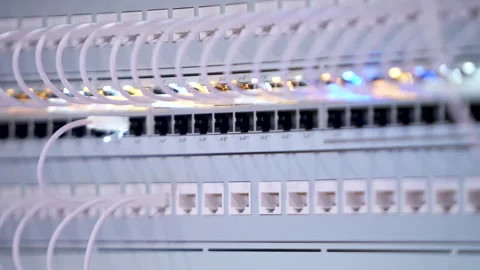 Switching hubs in IPS server room with cables and glowing lights Stock Footage 311733105