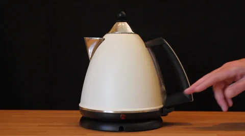 Switching a kettle on Stock Footage 38203991
