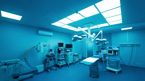 Switching on light in the dark empty surgery room. Stock Footage 219589651