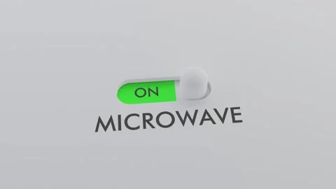 Switching on the MICROWAVE switch Stock Footage 256969585