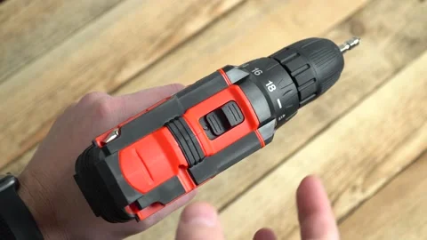 Switching modes of manual electric screwdriver in human hand Stock Footage 152934298