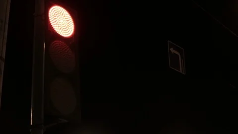 Switching traffic lights at night, red, yellow, green Stock Footage 107856744
